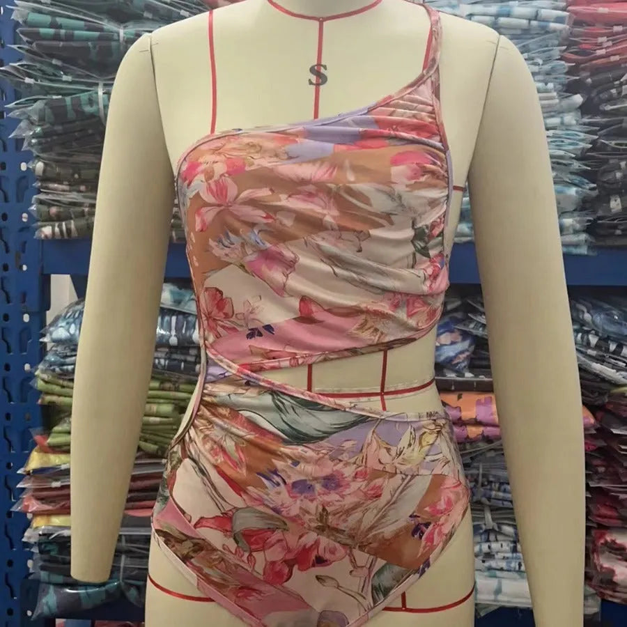 Women's rose gold patterned swimsuit made from polyester fibre in various sizes