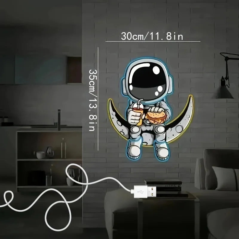 Blue Astronaut shaped LED neon light mounted on a wall, powered by USB.