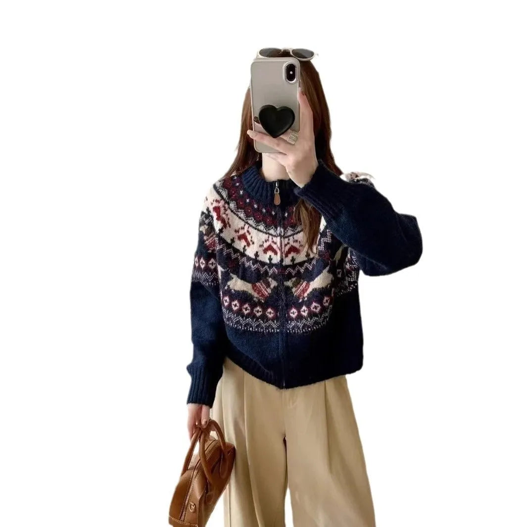 Ethnic style jacquard pullover sweater with 3D pattern in apricot colour, showing loose fit and long sleeves.