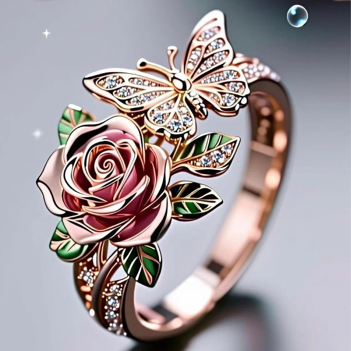 Colourful oil drip finish fairy style alloy ring with butterfly and floral motifs on an adjustable band.