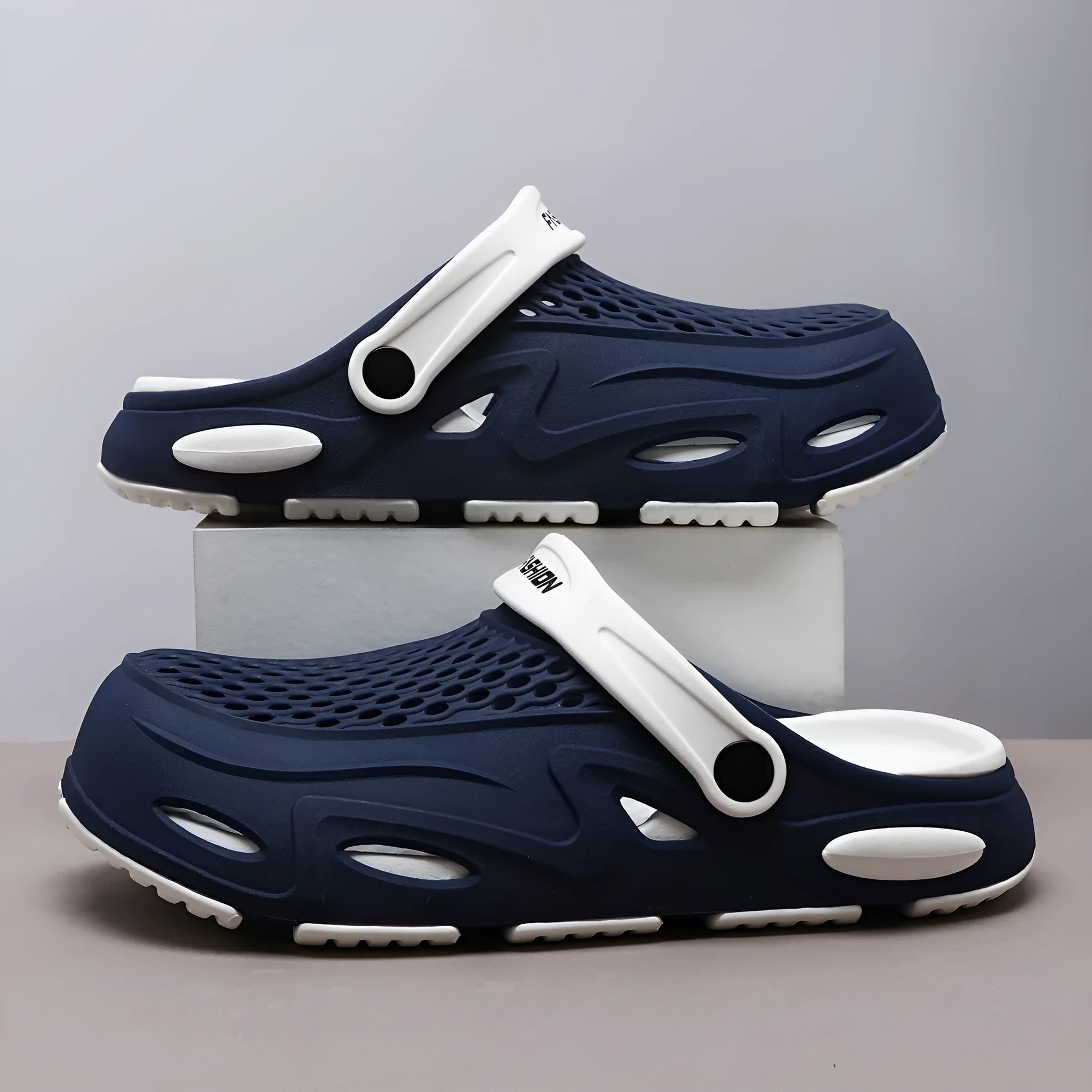 Men's grey closed toe beach slippers with EVA sole and round toe holder design