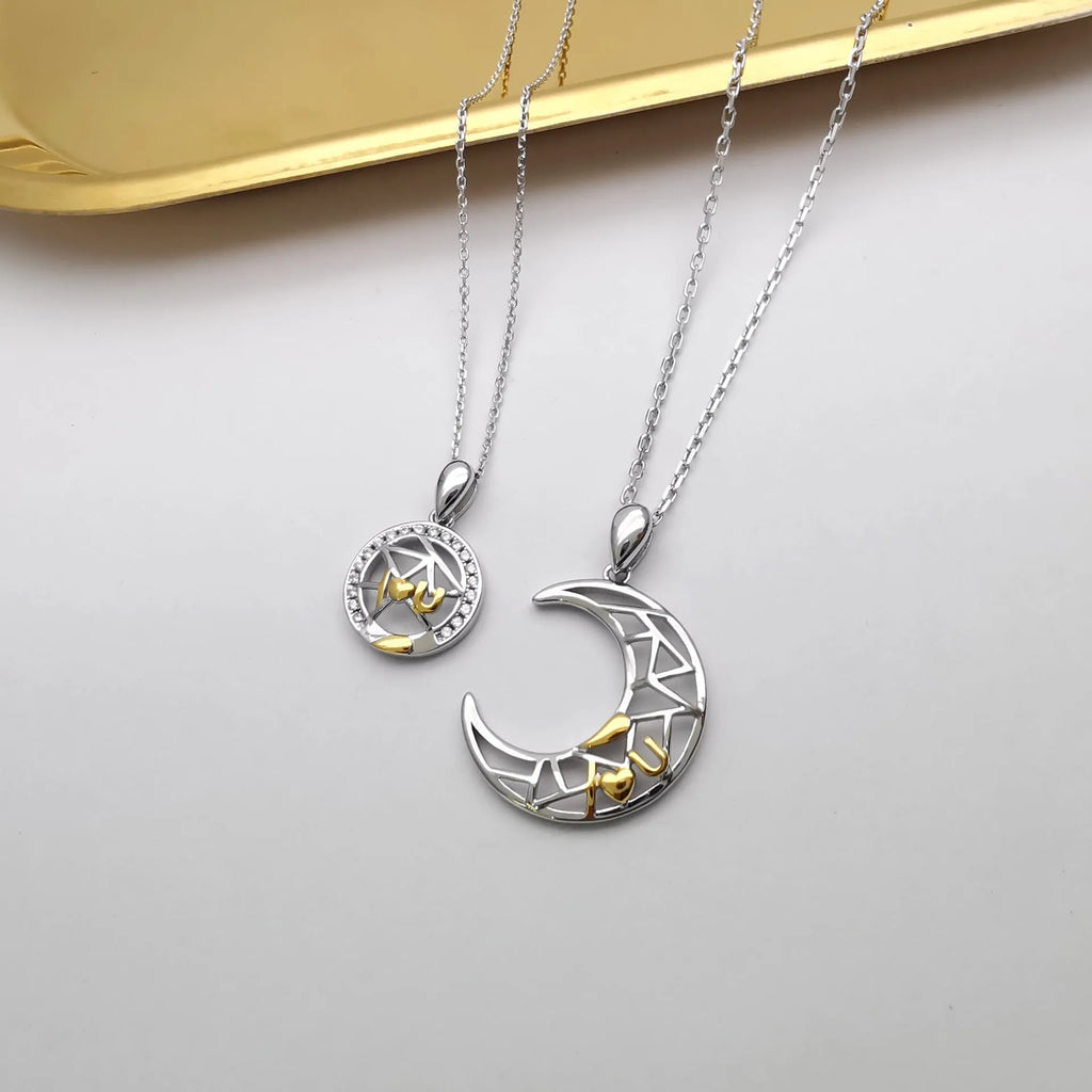 Copper sun and moon couple necklace with electroplated finish and cross chain.