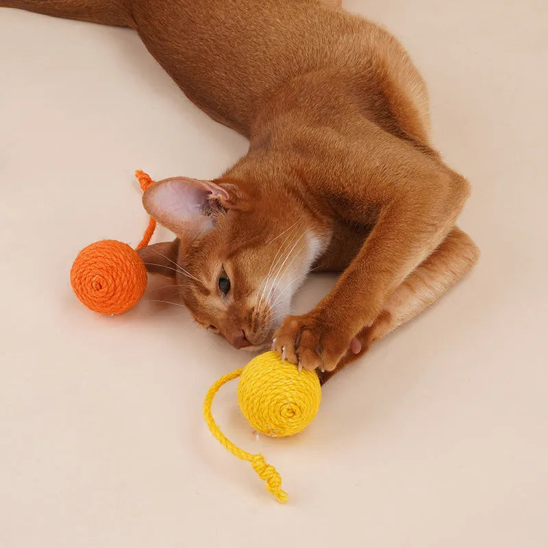 Four-piece cat toy set featuring a teaser stick and a catnip ball on a blue background