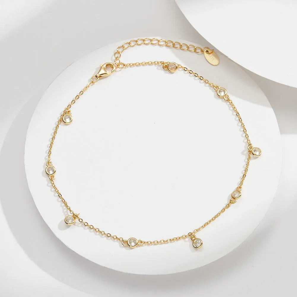 Women's silver anklet with geometric zirconium charm in gold or platinum colour