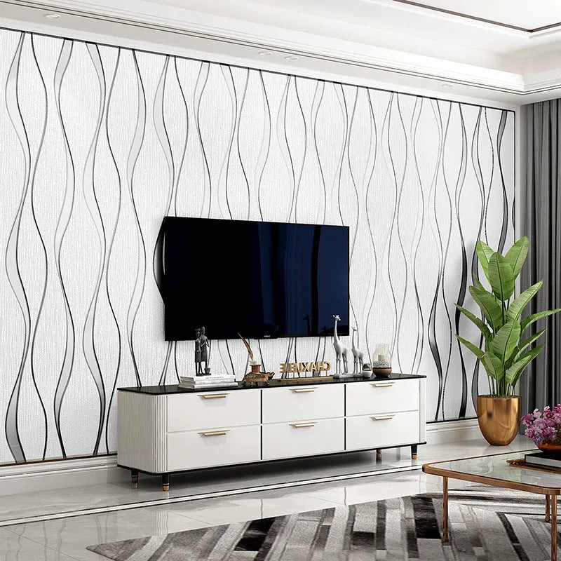Close-up of light grey 3D curved stripe wallpaper with textured velvet finish.