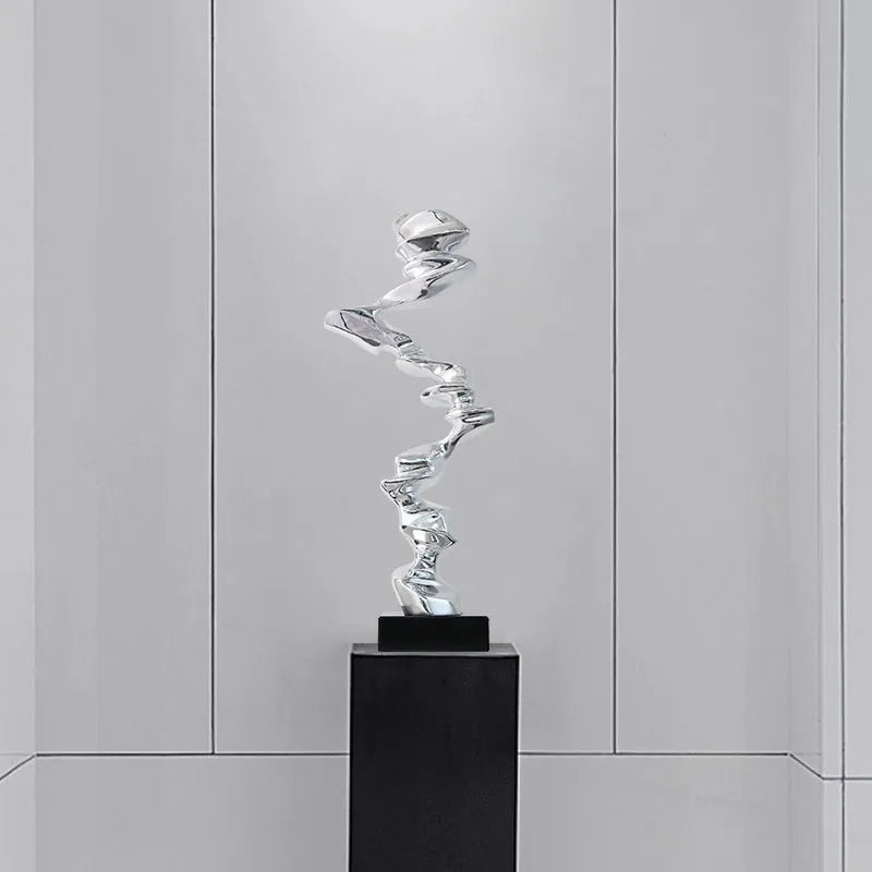 Minimalist abstract plastic and resin ornament in bright gold, silver, or blue for home and hotel decoration.