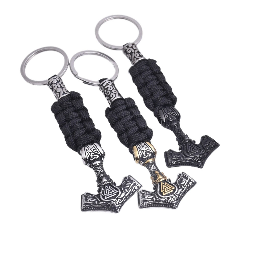 Viking triangle rune impactor keychain in stainless steel with animal motif, available in three metal finishes