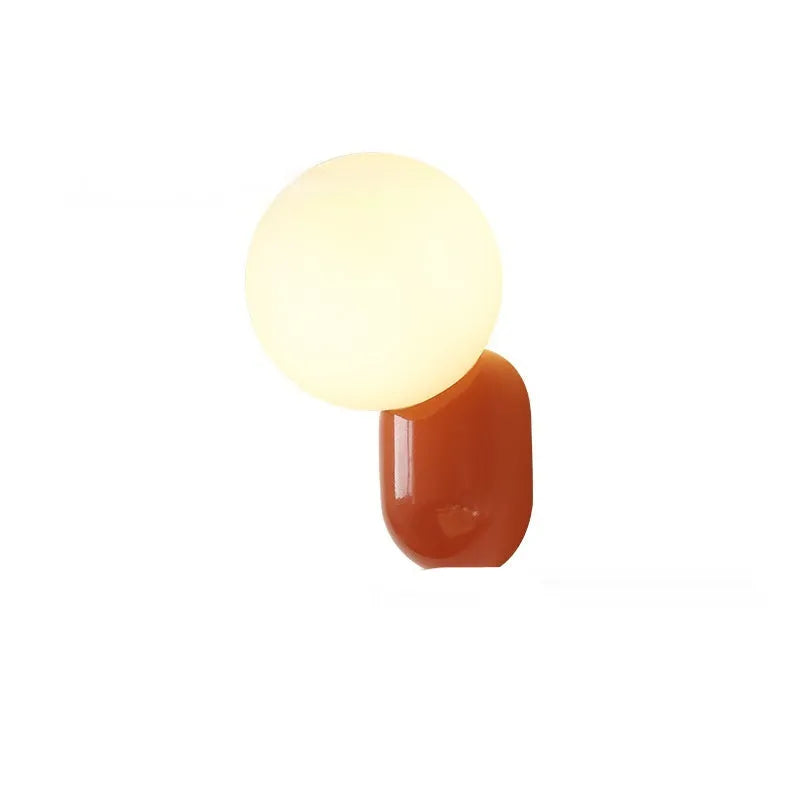 Small night lamp with alloy body and glass shade in matte black, 12×21cm, on a wall