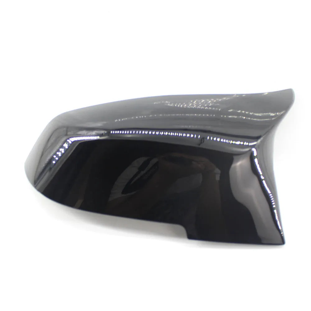 Pair of paint bright black horn-style BMW rearview mirror shells for F30 3 Series.
