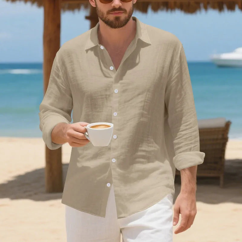 Linen Hawaiian casual shirt in a loose fit, shown in an earthy yellow colour on a hanger.