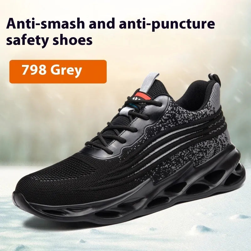 Lightweight brown leather labour protection safety shoes with a rubber sole on a work surface.