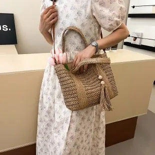 Women's woven straw crossbody shoulder bag in milky white colour with large capacity design