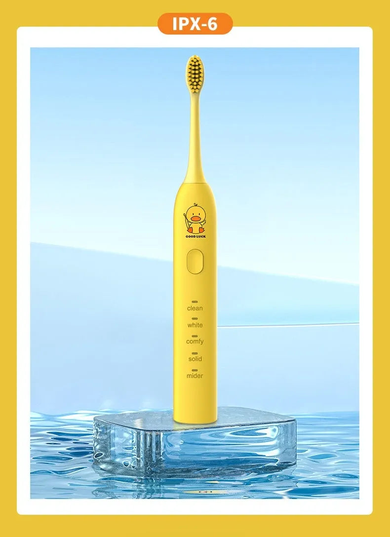 Yellow duck design USB rechargeable electric toothbrush with soft bristles and laser-engraved shell