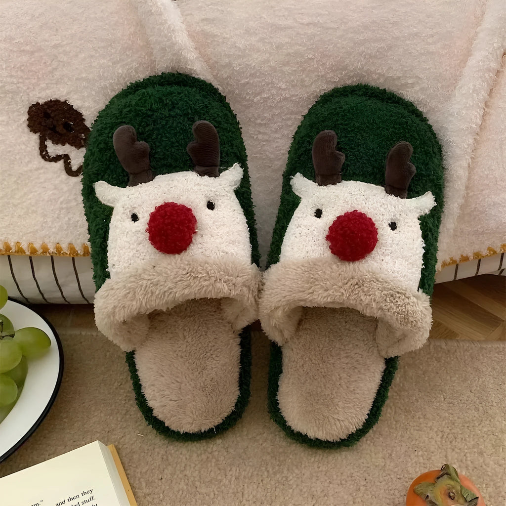 Women's Christmas deer patterned cotton slippers with anti-slip soles in brown, pink and green colours.