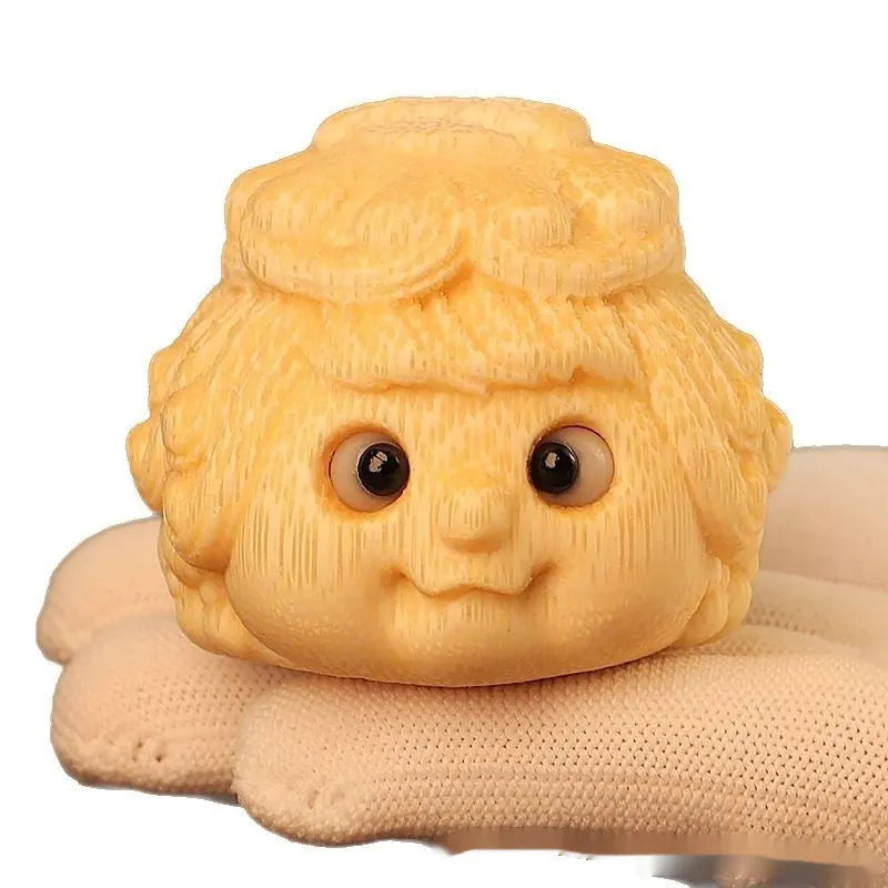Solid bamboo carving of a cute golden toad Princess ornament for home display.