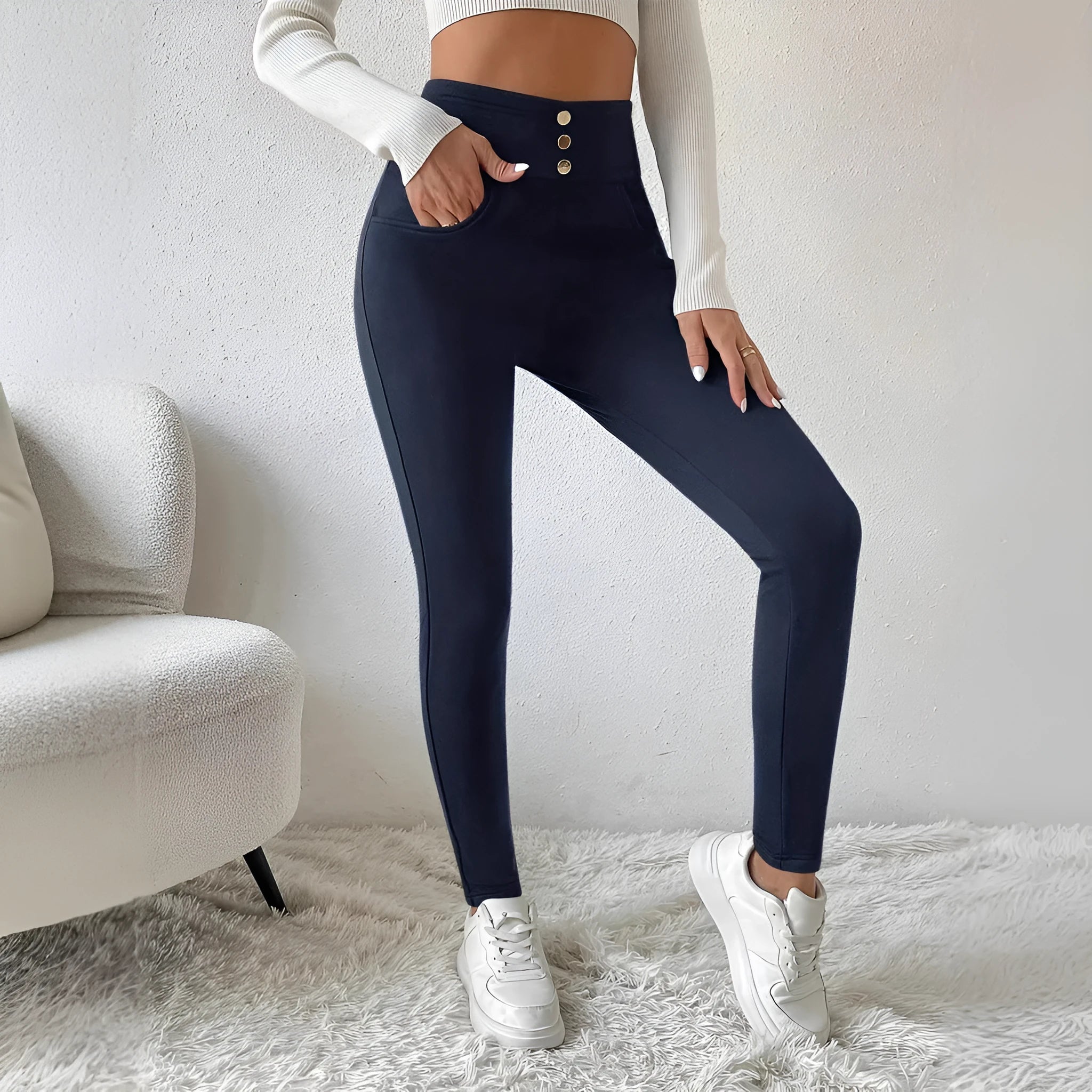 Navy blue women's casual trousers with high waist and straight leg cut on hanger