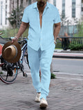 Men's loose-fit casual shirt and trousers suit in a cotton blend fabric, shown in a light blue colour.