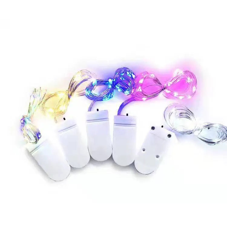 Copper wire LED button light string with battery box, shown in warm white and white light options.