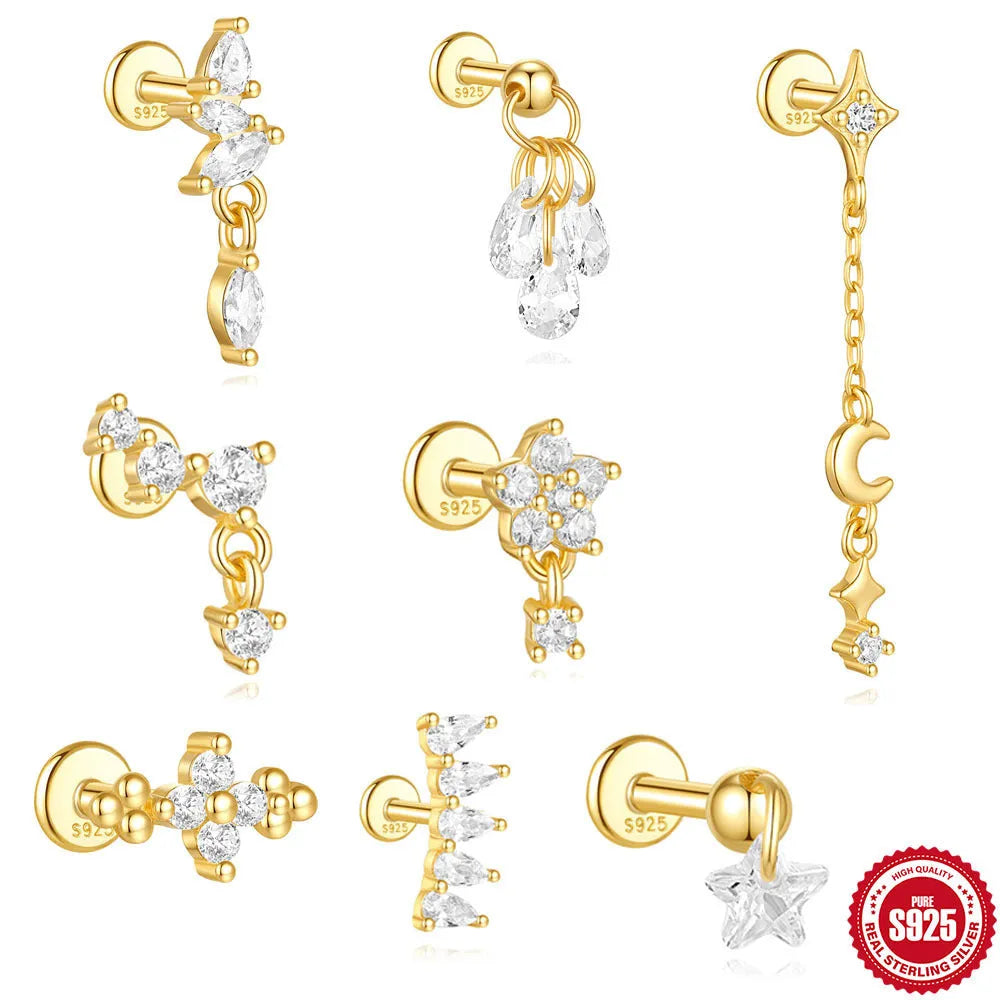 S925 sterling silver moon earring with a small diamond set in a star design on a gold-toned background.