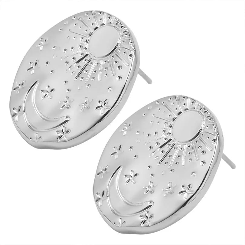A pair of geometric shell design stud earrings in 304 stainless steel with gold or silver electroplated finish.