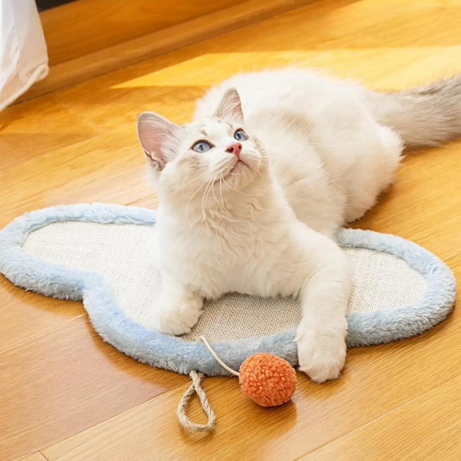 White cat scratching mat with cartoon sleeping cat pattern measuring 410mm by 210mm