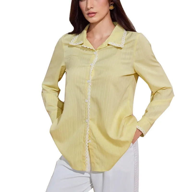 Women's solid yellow lace long-sleeved cardigan top with stitching detail on a plain background