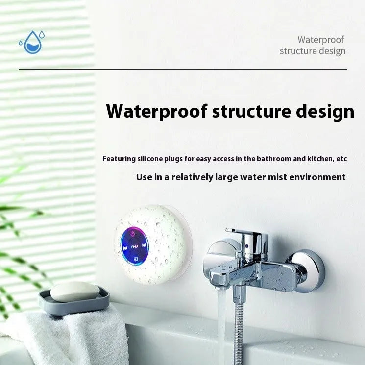 Waterproof Bluetooth speaker with large suction cup base and LED light in six colour options