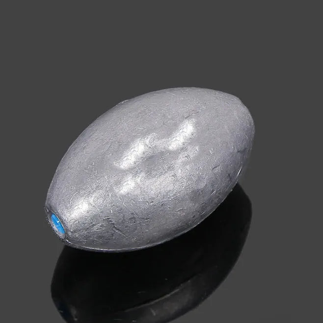 Tongxin lead fishing sinker with scale pattern, rugby shape, in weights from 10g to 150g