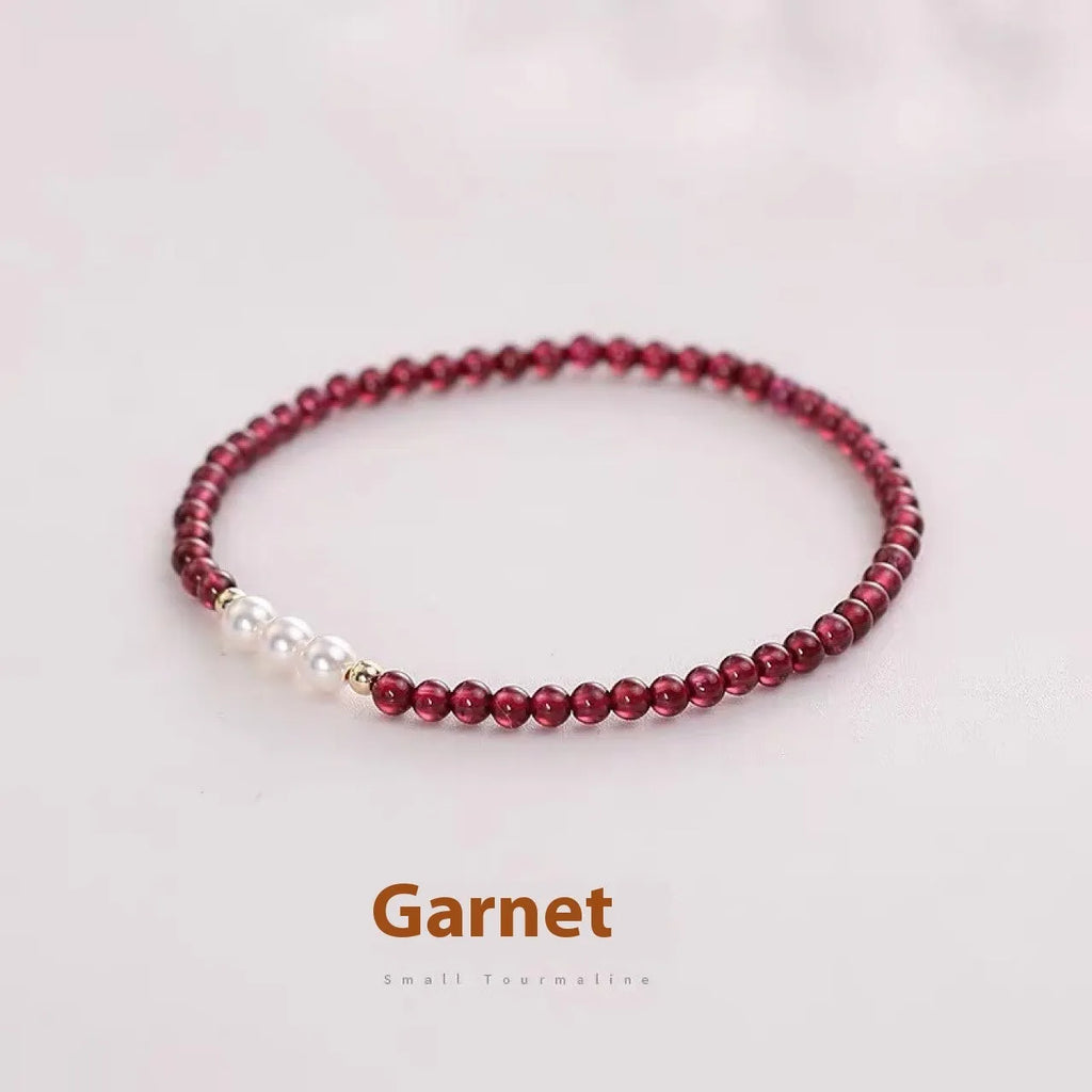 Garnet red crystal and white artificial pearl bracelet for women, shown in 3mm and 4mm bead size options.
