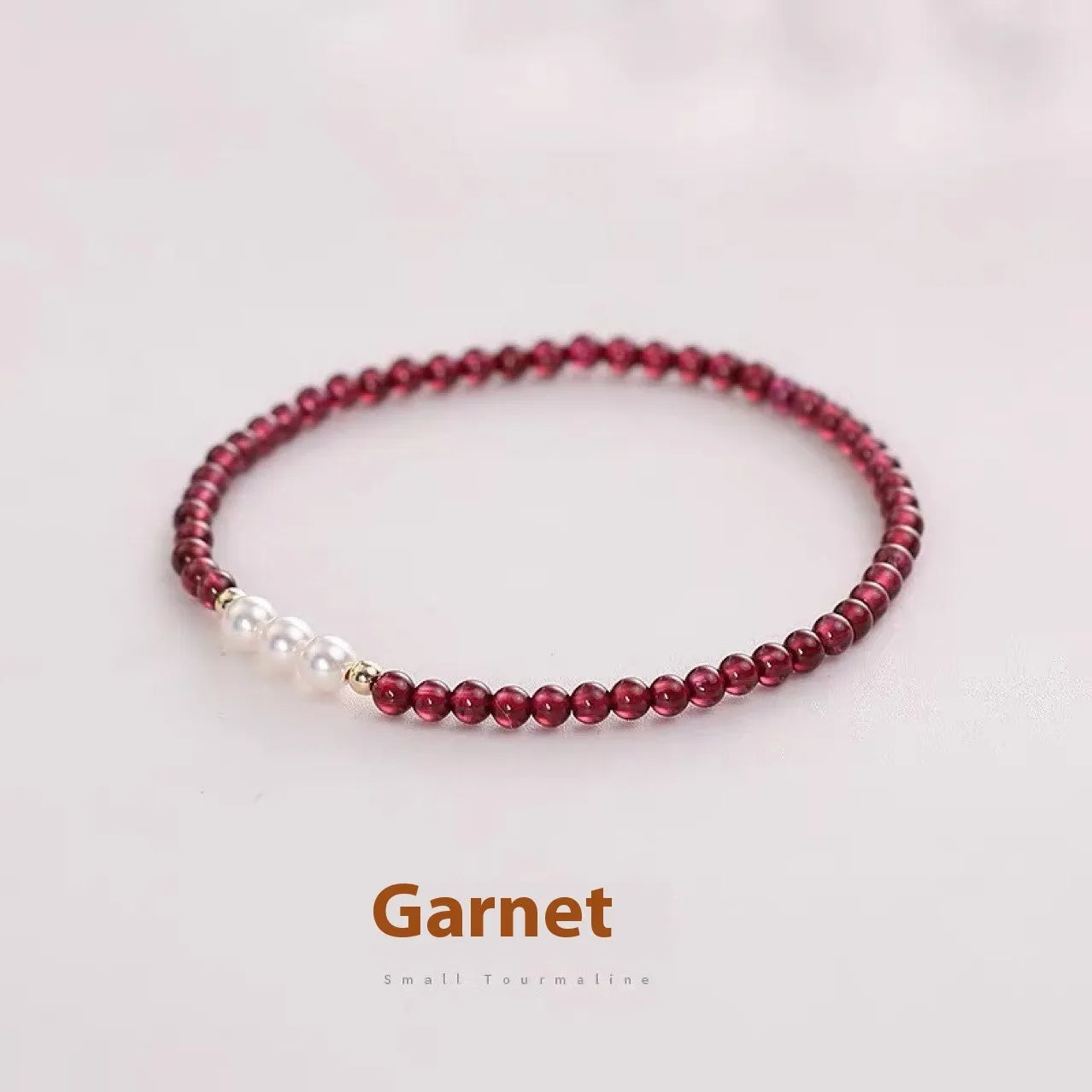 Garnet red crystal and white artificial pearl bracelet for women, shown in 3mm and 4mm bead size options.