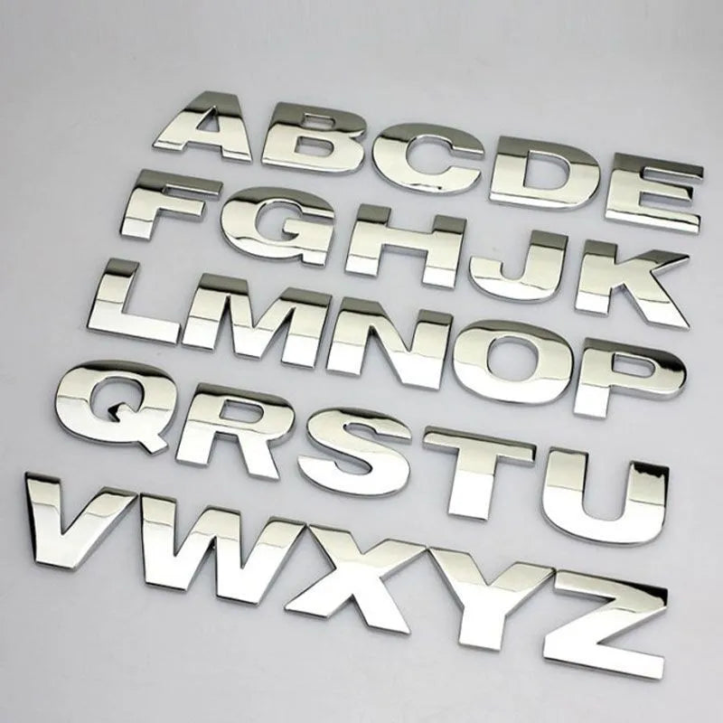 3D metal zinc alloy car bumper sticker showing raised letter A in silver finish, approximately 2.5cm in size.