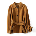 Women's Caramel Mocha cashmere coat with Peter Pan collar and leather stitching in a loose retro fit.