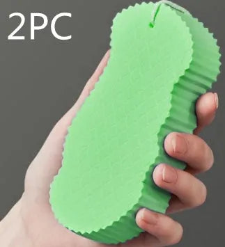 White 3D bath sponge with fish scale pattern for gentle body exfoliation in shower.
