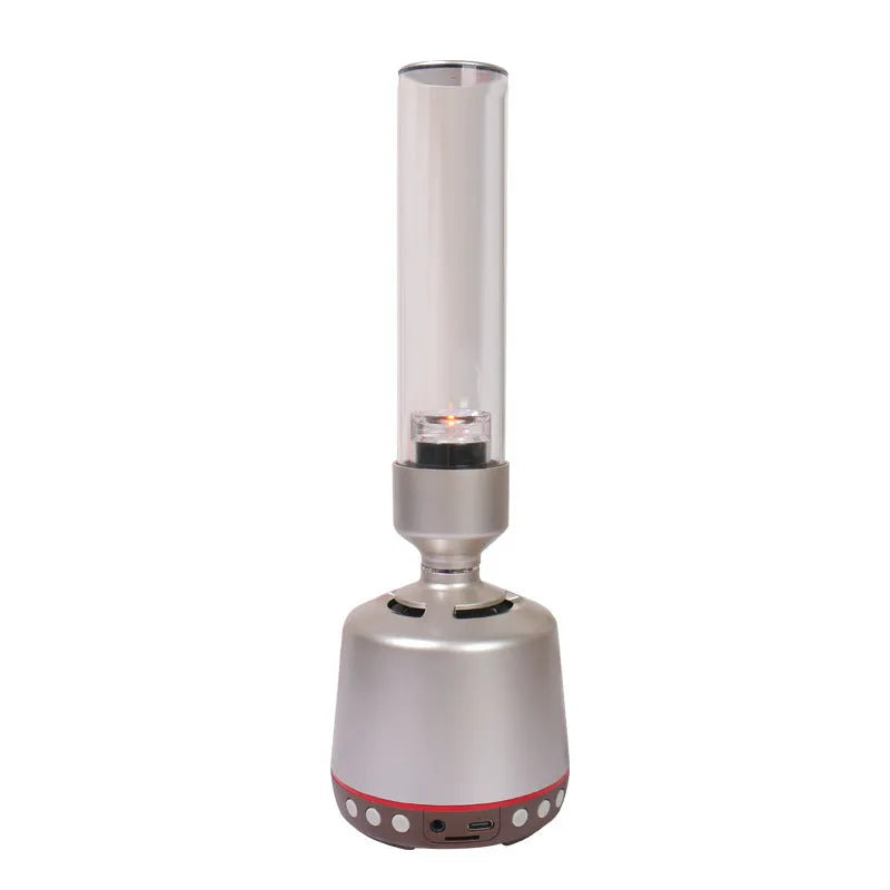 White Silver Candlelight Bluetooth speaker and night light with modern cylindrical design.