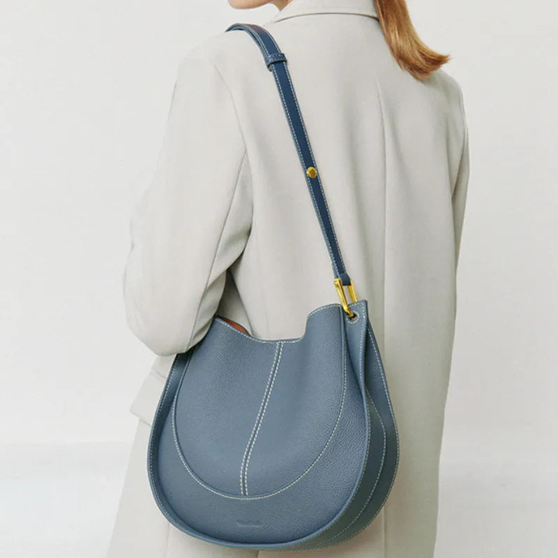 Designer small crossbody bag for women, genuine leather, round shape, retro splicing, milkshake white colour