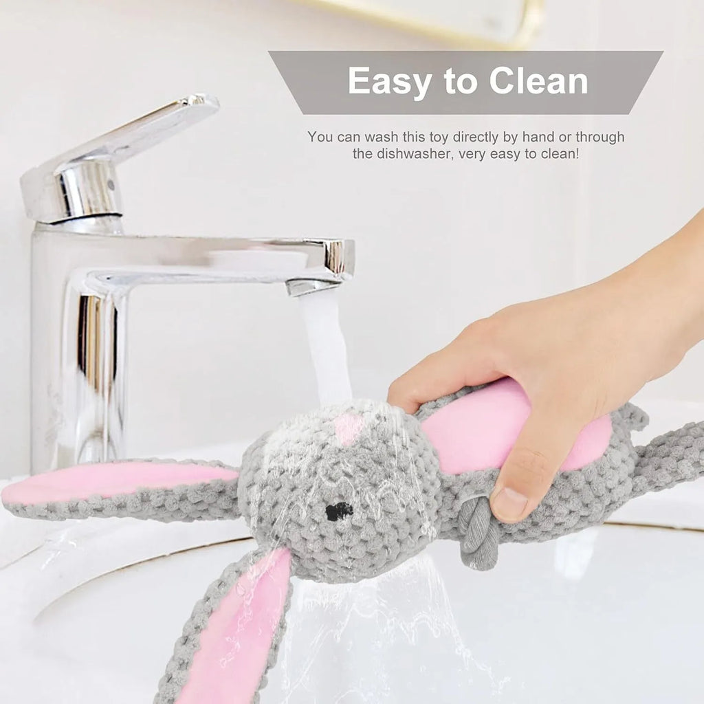 Soft plush dog toy with animal design, cotton rope tail, and internal squeaker and crinkle paper