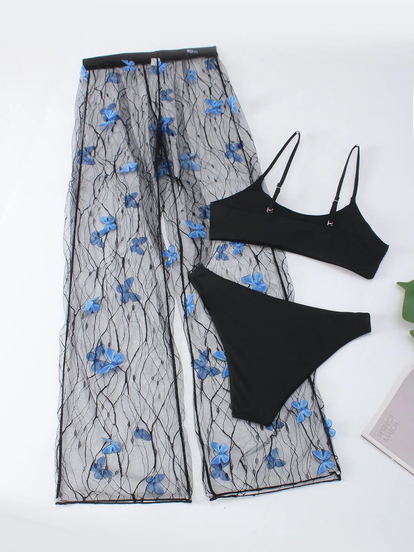 Black transparent voile bikini set with butterfly pattern showing top, underwear and pants pieces