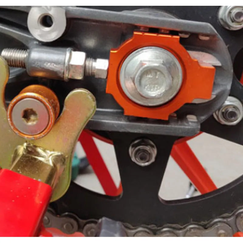 Pair of orange motorcycle rear fork screw regulators for KTM DUKE 200 390 990.