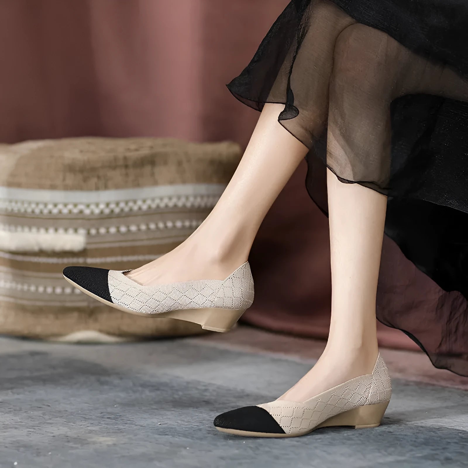 Women's casual wedge knitted shoes in apricot with a mid heel and rubber sole.