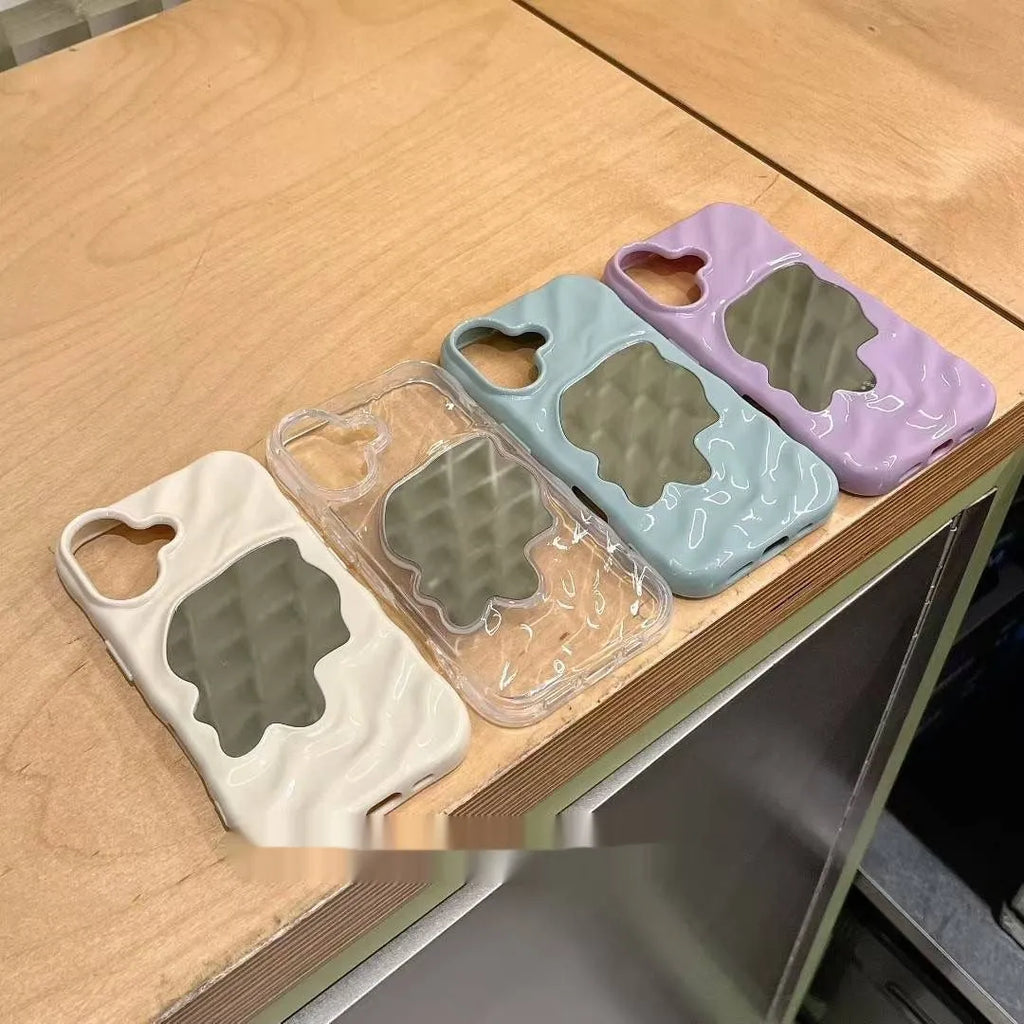 Water ripple solid colour mirror iPhone case in beige, shown on an iPhone