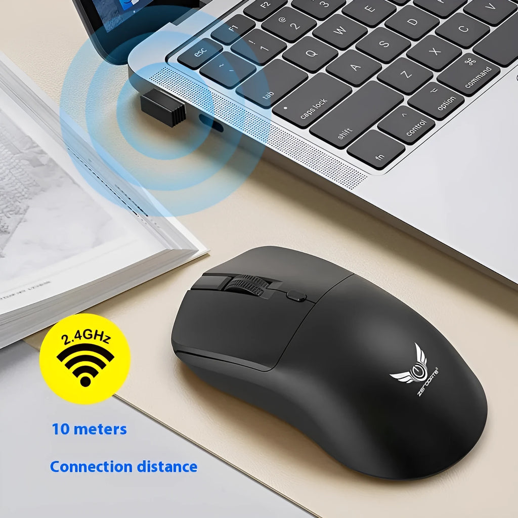 Black wireless computer mouse with a three-gear volume control button on the side.