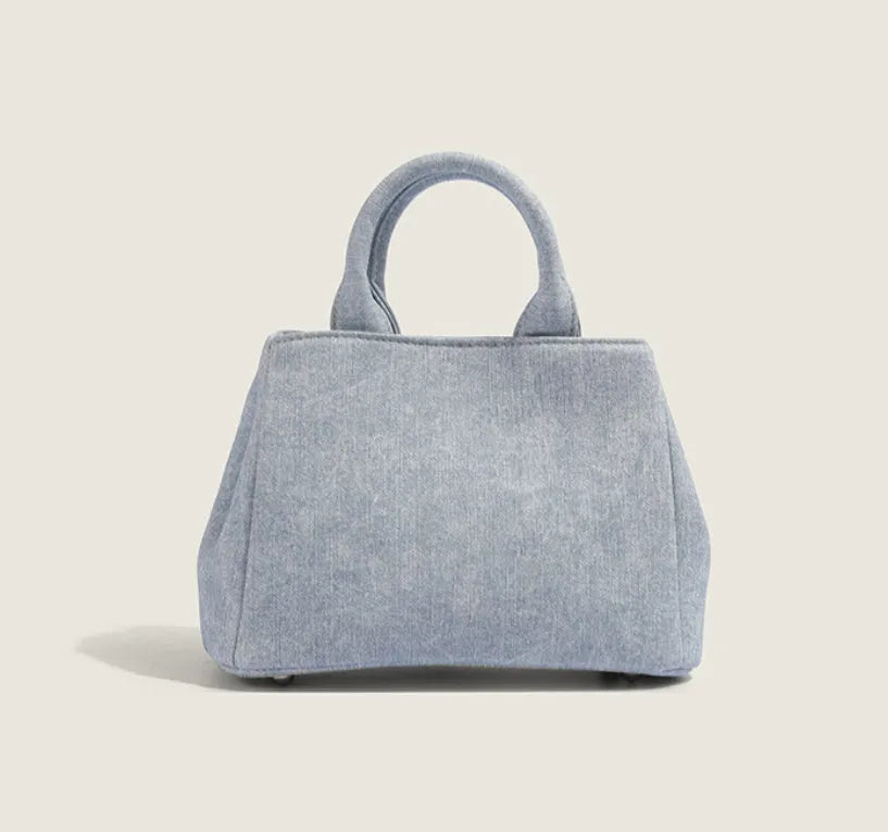 Women's denim-style shoulder bag in soft PU material with standard size and polyester lining