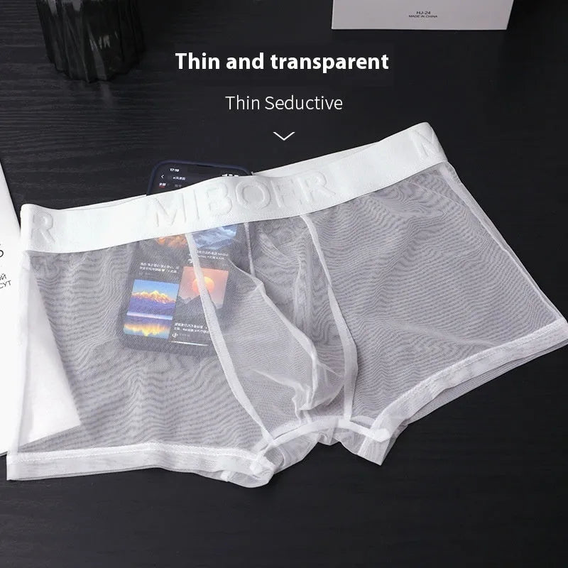 Men's solid-colour thin boxer shorts in quick-drying polyester fabric on a size chart