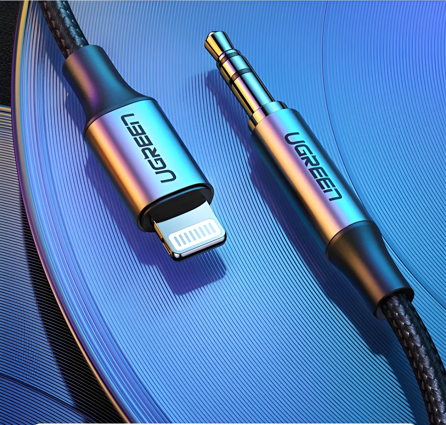 Black braided Apple Lightning to 3.5mm audio adapter cable with aluminium connectors for car use.
