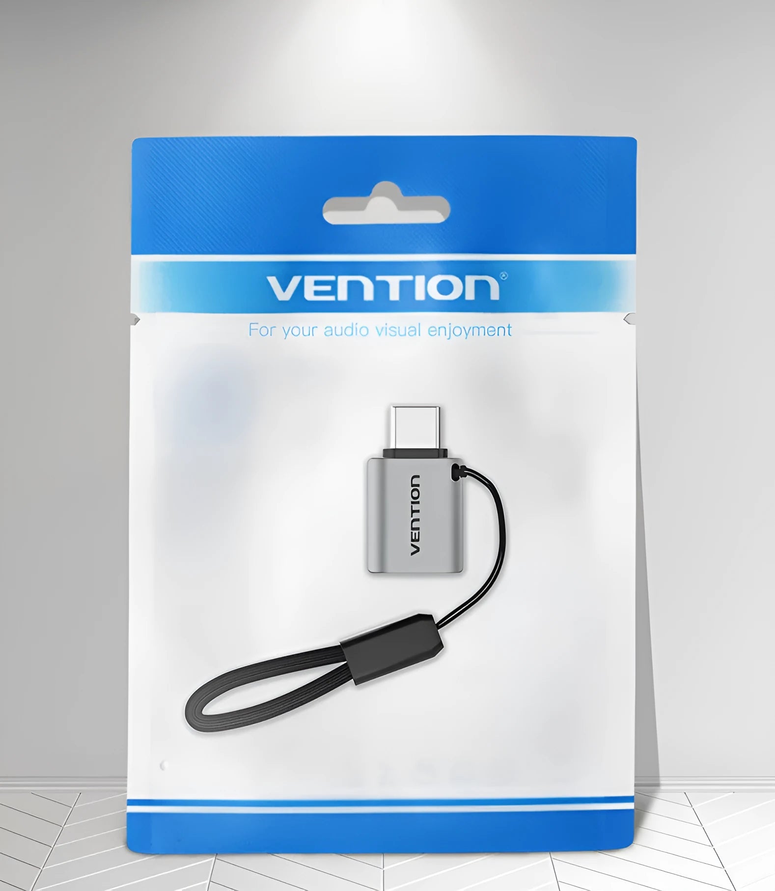 Grey aluminium alloy USB-C to USB-A OTG adapter with attached lanyard