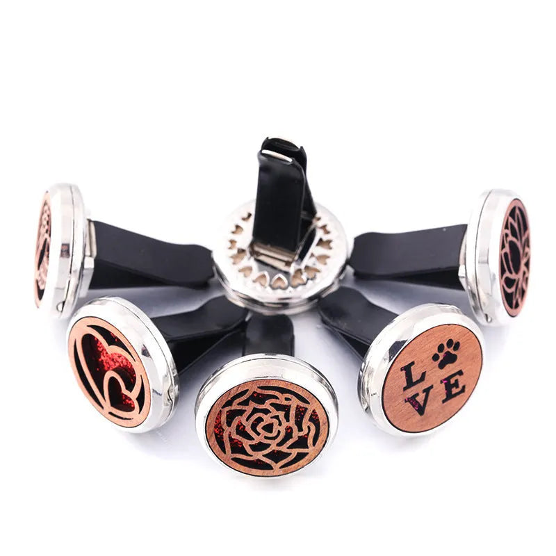 Circular car air vent aromatherapy clip with hollow wood and alloy construction in multiple colour options