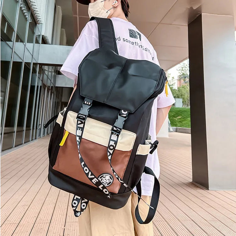 Oxford cloth fashion backpack in black, green, or red, shown with adjustable straps for multiple carrying styles.