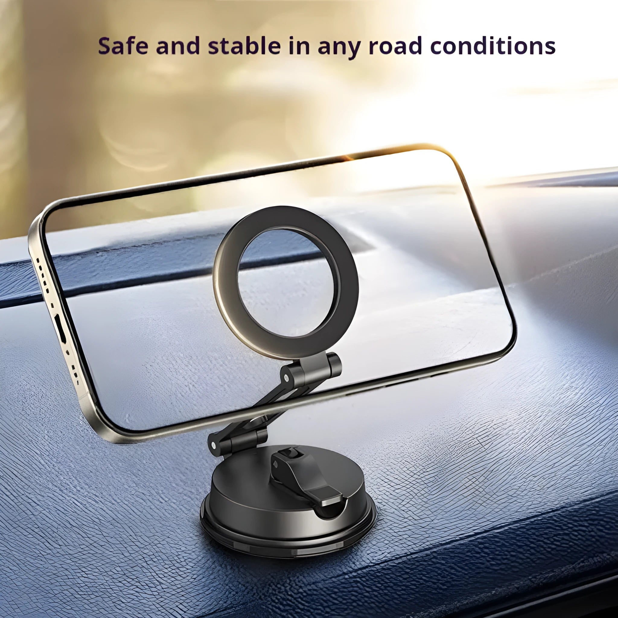 Black H154 car magnetic phone holder with suction cup mount on a car dashboard.