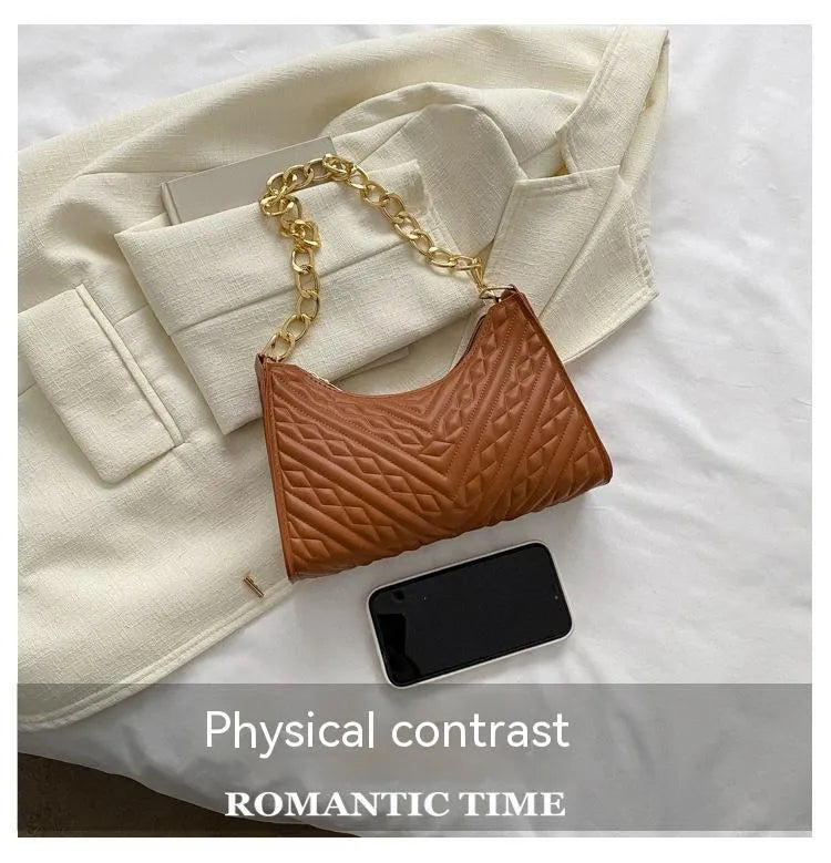 Brown PU leather pleated chain baguette shoulder bag showing adjustable strap and square shape