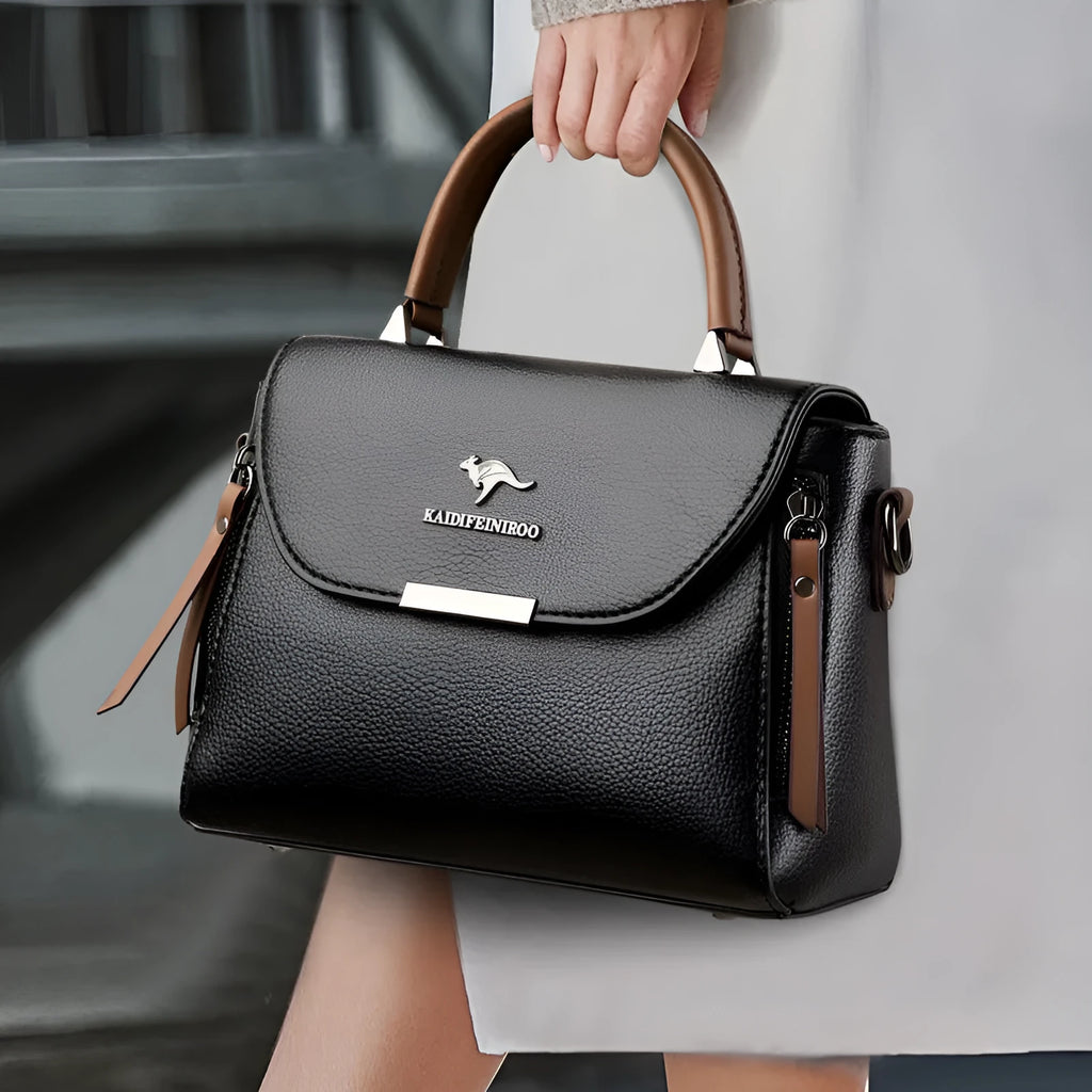Women's genuine leather crossbody shoulder bag in horizontal square shape with slit pocket and visible stitching, six colour options